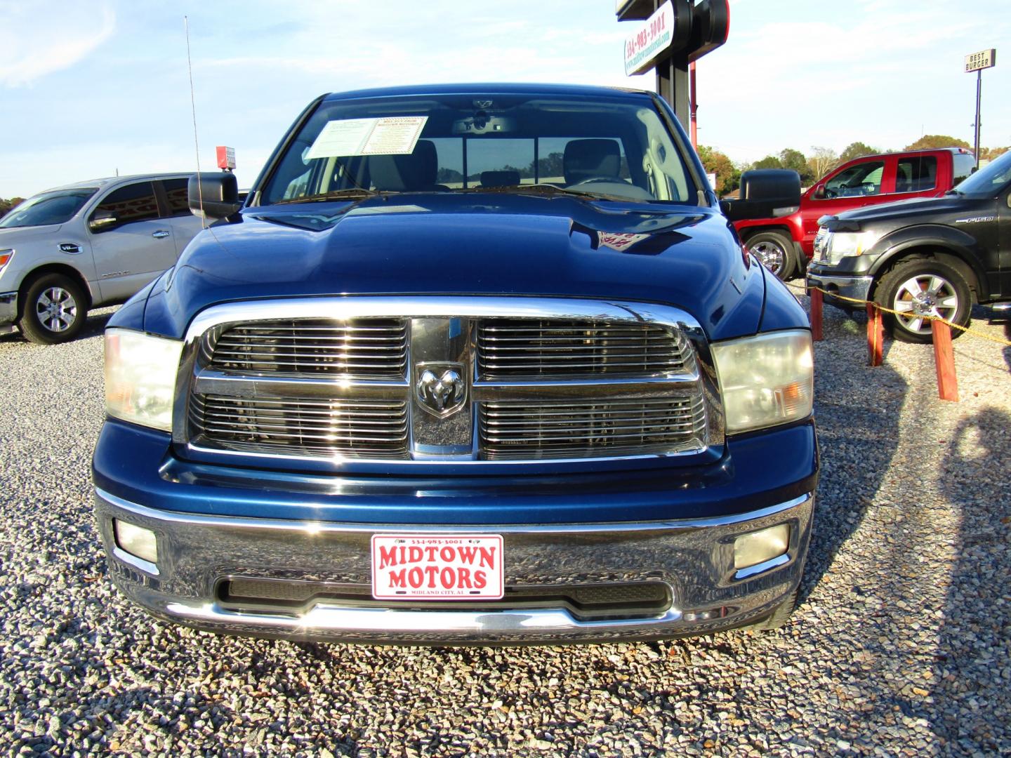 2011 Blue Dodge Ram 1500 SLT Quad Cab 2WD (1D7RB1GT3BS) with an 5.7L V8 OHV 16V engine, Automatic transmission, located at 15016 S Hwy 231, Midland City, AL, 36350, (334) 983-3001, 31.306210, -85.495277 - Photo#1